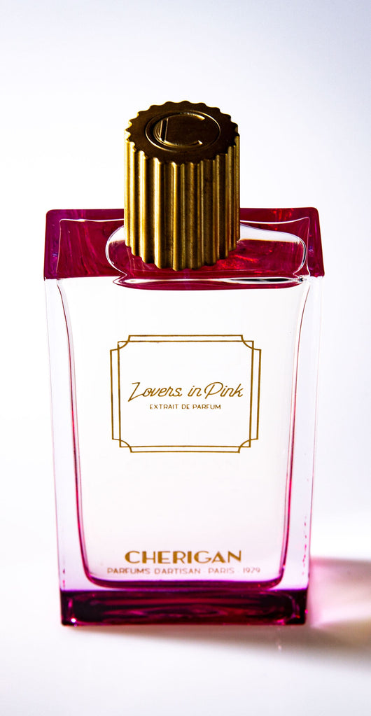 Lovers in Pink 100ml bottle top visual with golden cap 
